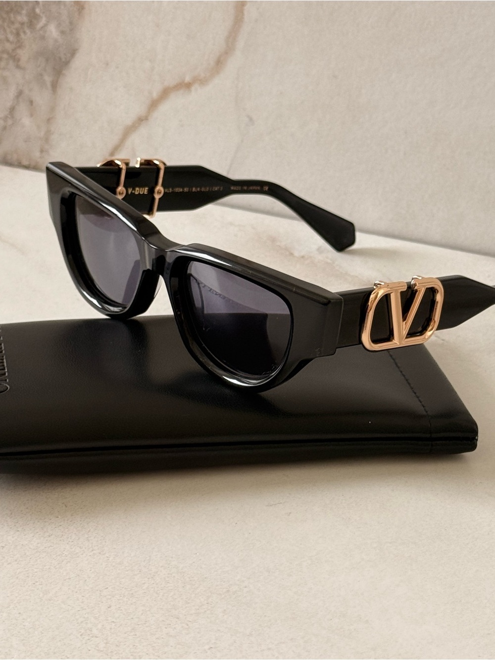 Valentino Black Cat-Eye Sunglasses with Rose Gold V Emblems